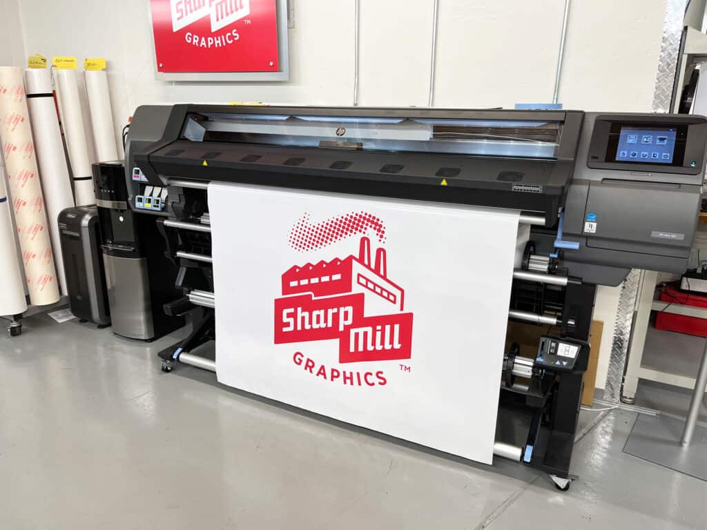 A fulfillment room includes a large printing machine.