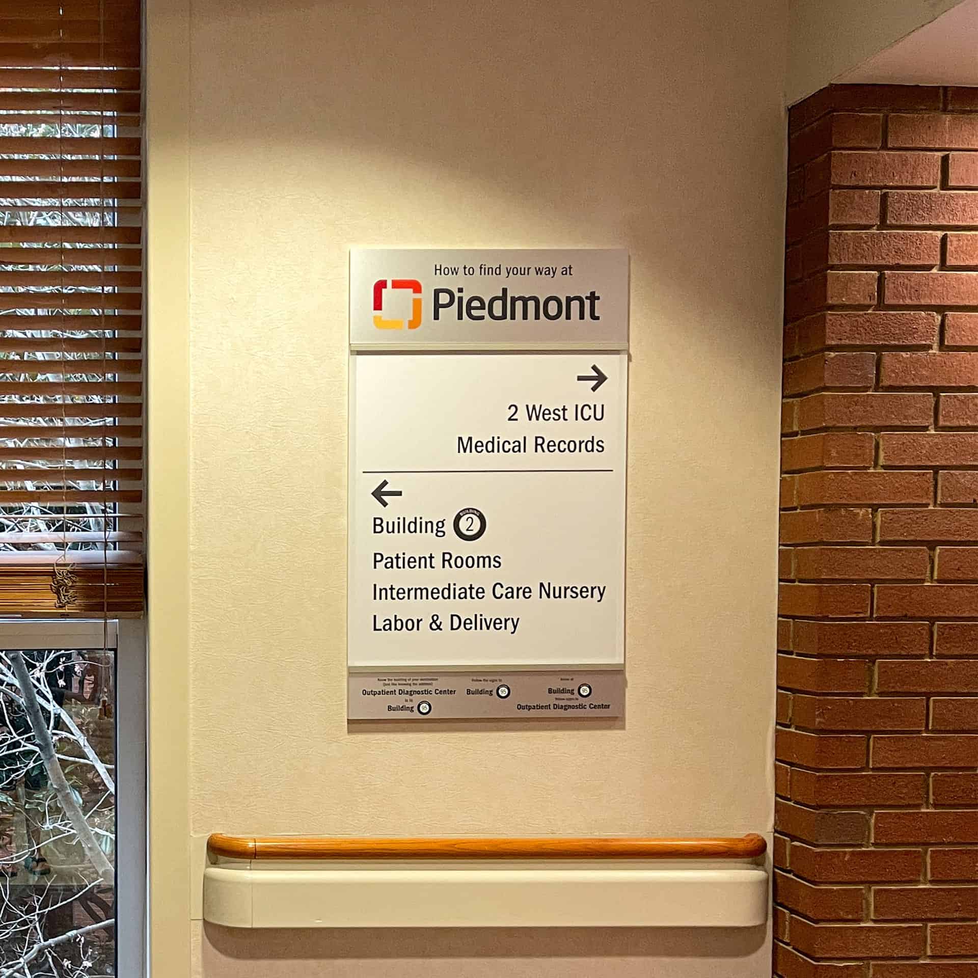 A sign in a hospital lobby.