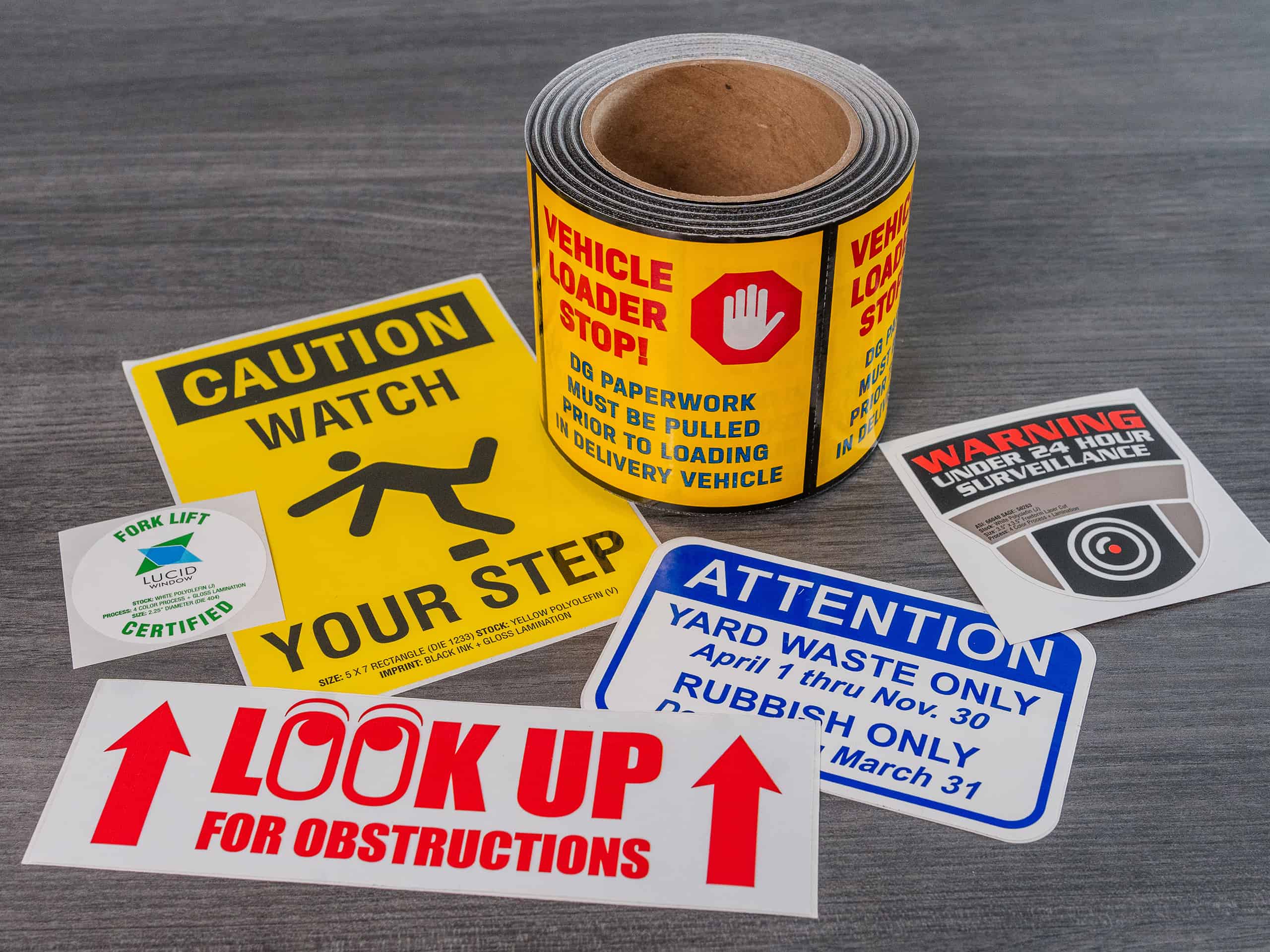 A table featuring a variety of warning stickers for enhanced fulfillment.