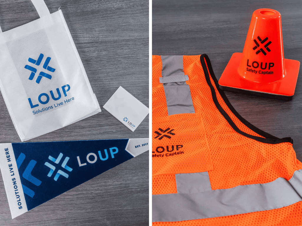 A photo of a safety vest, a cone, and a bag.